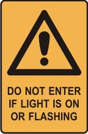 DO NOT ENTER IF LIGHT IS ON OR FLASHING WITH PICTO