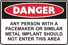 ANY PERSON WITH A PACEMAKER OR SIMILAR METAL IMPLANT SHOULD NOT ENTER THIS AREA