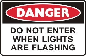 DO NOT ENTER WHEN LIGHTS ARE FLASHING